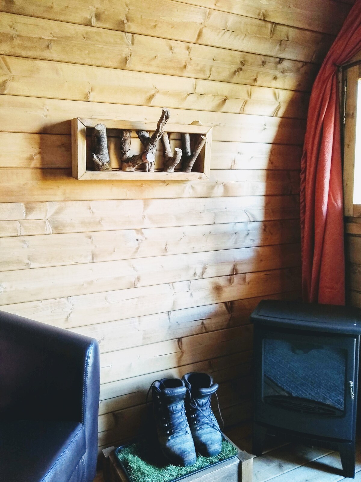 Toasty fire/space heater, boot storage and coat rack